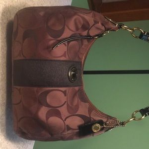 Coach bag. Coach logo fabric.